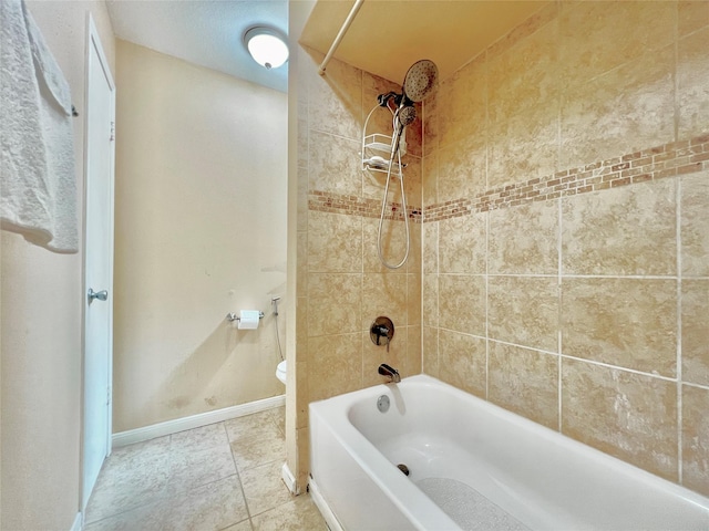 18738 Shannon Glen Ln, Houston, TX 77084 - bathroom with bathtub / shower combination and tile patterned floors