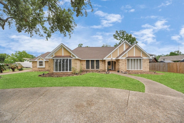 2514 Loganberry Cir, Seabrook, TX 77586 - tudor-style house with brick siding