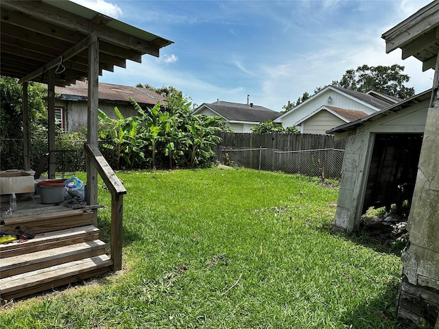 213 W Lobit St, Baytown, TX 77520 - view of yard with a deck