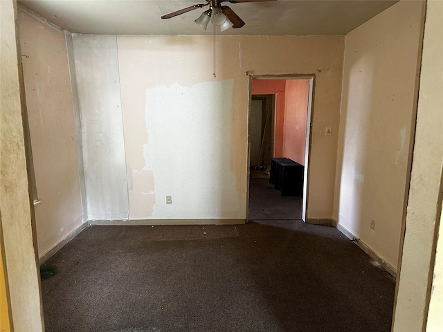 213 W Lobit St, Baytown, TX 77520 - unfurnished room with dark colored carpet and a ceiling fan