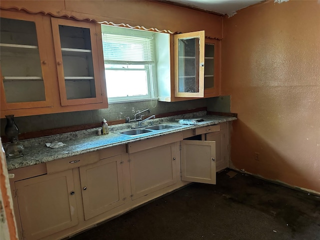 213 W Lobit St, Baytown, TX 77520 - kitchen with glass insert cabinets, white cabinetry, and light countertops