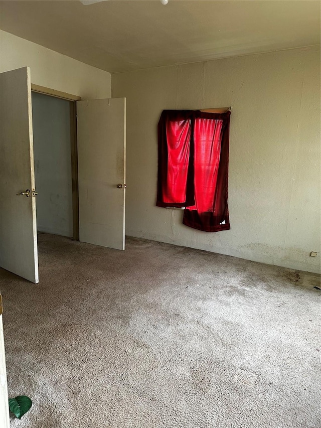 213 W Lobit St, Baytown, TX 77520 - spare room featuring carpet