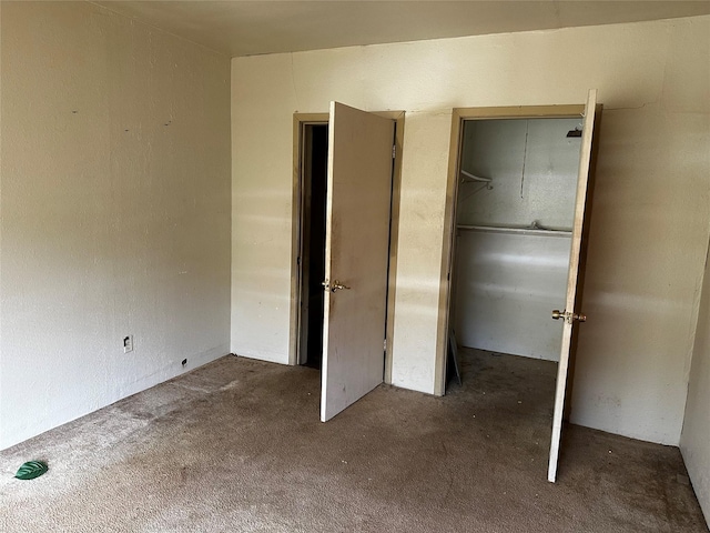 213 W Lobit St, Baytown, TX 77520 - unfurnished bedroom featuring a closet and carpet floors