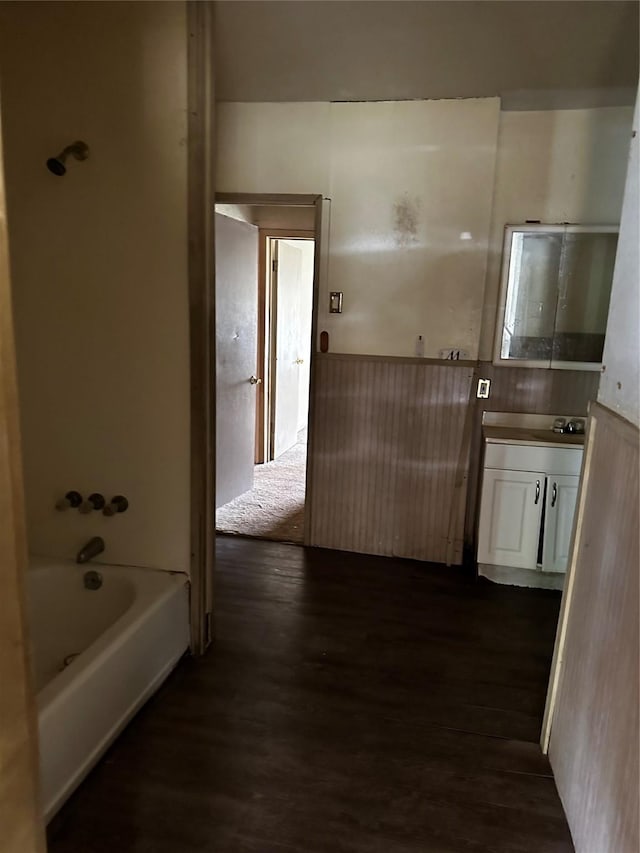 213 W Lobit St, Baytown, TX 77520 - bathroom with vanity, wood finished floors, and shower / bath combination