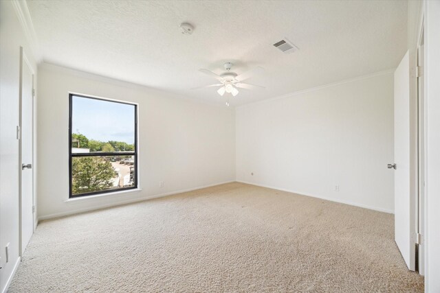 33 Lakewood Ln, Seabrook, TX 77586 - carpeted empty room featuring ornamental molding, a ceiling fan, and a smoke detector