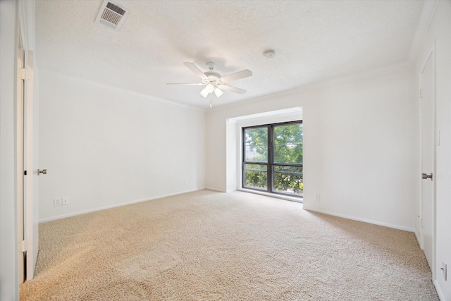 33 Lakewood Ln, Seabrook, TX 77586 - carpeted empty room featuring ceiling fan, ornamental molding, and a smoke detector