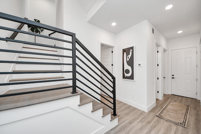 3602 Runnels St, Houston, TX 77003 - entryway featuring stairway, light wood-type flooring, and recessed lighting