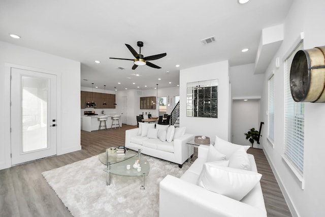 3602 Runnels St, Houston, TX 77003 - living area with a ceiling fan, wood finished floors, and recessed lighting