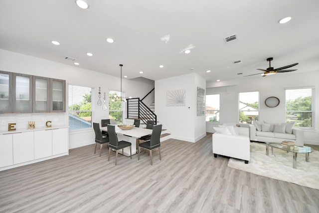 3602 Runnels St, Houston, TX 77003 - dining space featuring stairs, recessed lighting, healthy amount of natural light, light wood-style floors, and a ceiling fan