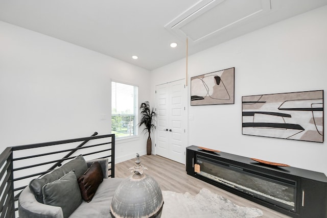 3602 Runnels St, Houston, TX 77003 - living room featuring attic access, wood finished floors, and recessed lighting
