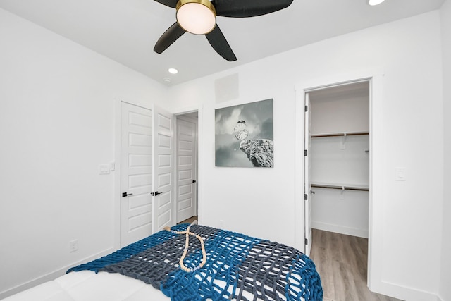 3602 Runnels St, Houston, TX 77003 - bedroom with wood finished floors, a spacious closet, a closet, recessed lighting, and a ceiling fan