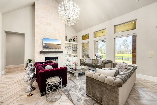 17023 Sweet Bay Ct, Conroe, TX 77385 - living room featuring high vaulted ceiling, a chandelier, a stone fireplace, and built in shelves
