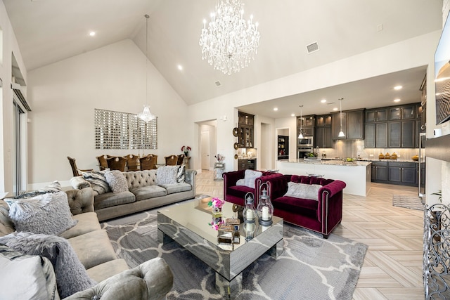 17023 Sweet Bay Ct, Conroe, TX 77385 - living area featuring a chandelier, high vaulted ceiling, and recessed lighting