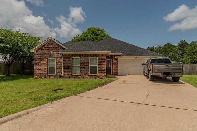 7475 Wooded Creek Dr, Beaumont, TX 77708 - view of front of property with brick siding, a garage, driveway, and a shingled roof
