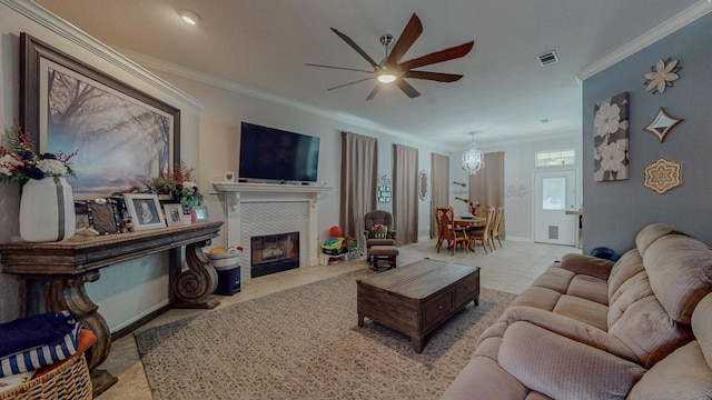 7475 Wooded Creek Dr, Beaumont, TX 77708 - living area featuring ceiling fan, crown molding, and a fireplace