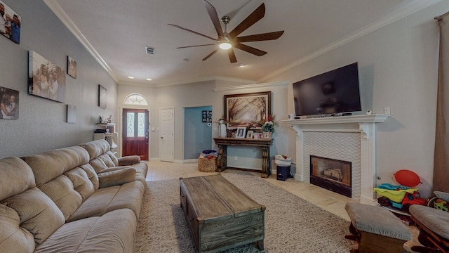7475 Wooded Creek Dr, Beaumont, TX 77708 - living room featuring ceiling fan, a fireplace, crown molding, and recessed lighting