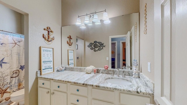 7475 Wooded Creek Dr, Beaumont, TX 77708 - bathroom with vanity and toilet
