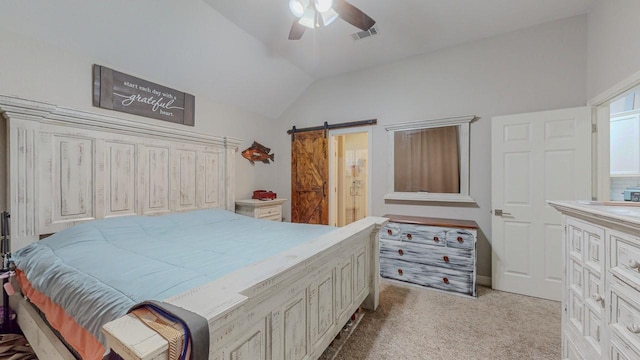 7475 Wooded Creek Dr, Beaumont, TX 77708 - carpeted bedroom featuring vaulted ceiling, a barn door, a ceiling fan, and connected bathroom