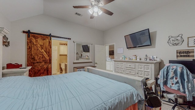 7475 Wooded Creek Dr, Beaumont, TX 77708 - bedroom featuring lofted ceiling, a ceiling fan, and a barn door