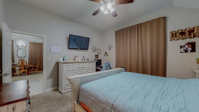 7475 Wooded Creek Dr, Beaumont, TX 77708 - bedroom with light carpet, vaulted ceiling, a chandelier, and ceiling fan