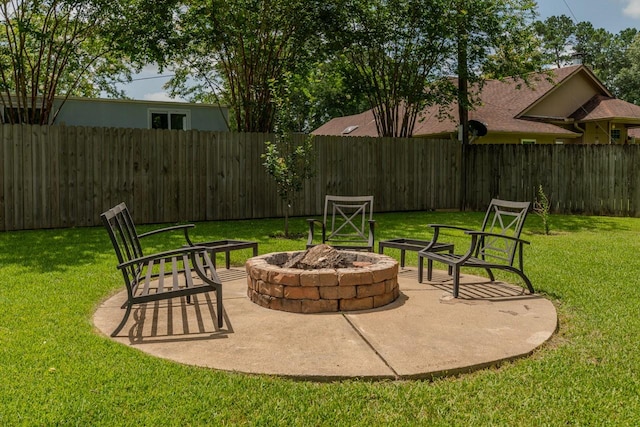 7475 Wooded Creek Dr, Beaumont, TX 77708 - view of patio / terrace with a fire pit