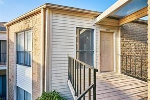 3724 Woodchase Dr, Houston, TX 77042 - view of exterior entry featuring brick siding