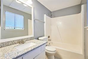 3724 Woodchase Dr, Houston, TX 77042 - bathroom featuring shower / bathtub combination and vanity