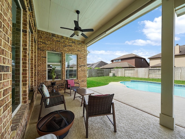 4202 Lodge Ranch Ct, Fulshear, TX 77441 - fenced backyard with ceiling fan and a patio