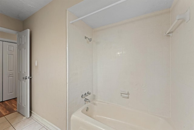9602 Philmont Dr, Houston, TX 77080 - full bathroom featuring tile patterned floors and tub / shower combination