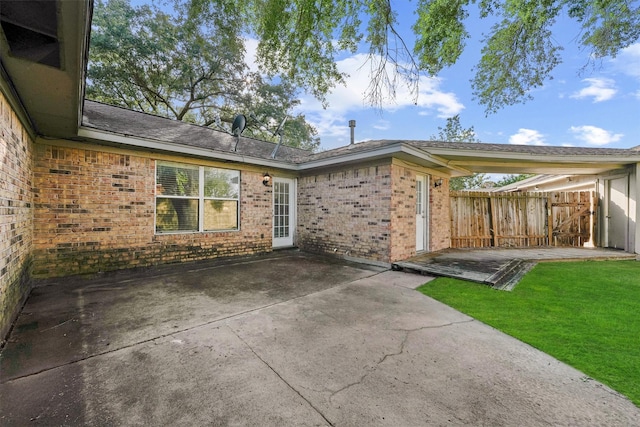9602 Philmont Dr, Houston, TX 77080 - back of property with brick siding and a patio area