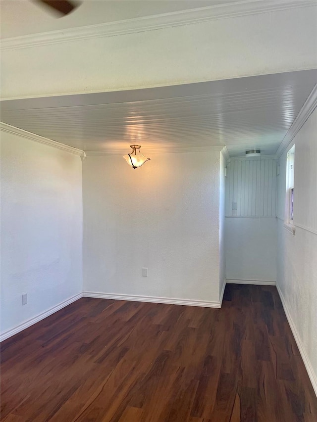 717 W Brazos St, Freeport, TX 77541 - spare room featuring dark wood finished floors and ornamental molding