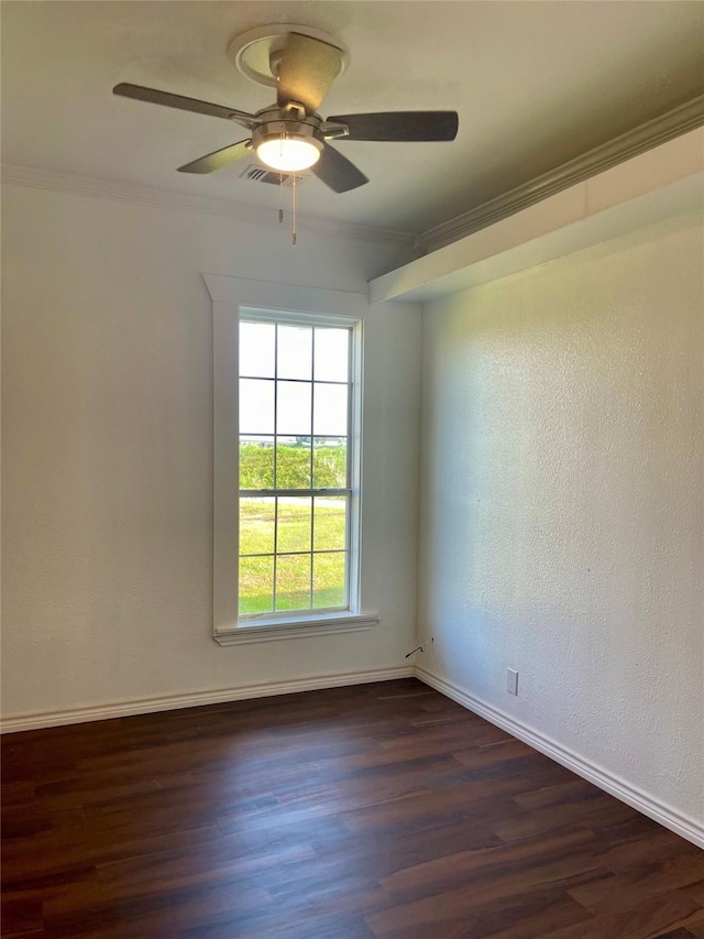717 W Brazos St, Freeport, TX 77541 - spare room with ornamental molding, dark wood-style flooring, and ceiling fan
