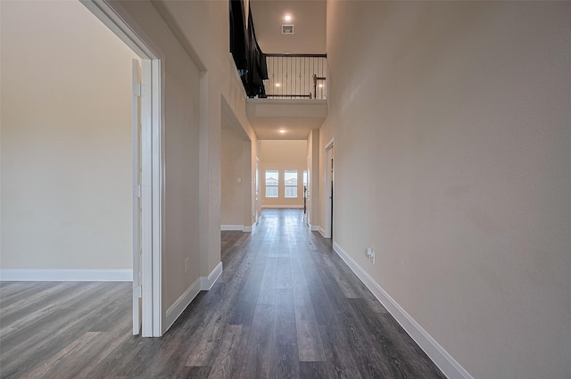 14538 Bending Maple Dr, Houston, TX 77069 - hall with dark wood-style flooring and baseboards