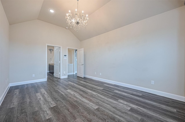 14538 Bending Maple Dr, Houston, TX 77069 - empty room featuring vaulted ceiling, dark wood-style flooring, a chandelier, and recessed lighting