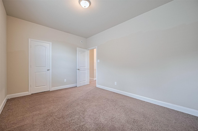 14538 Bending Maple Dr, Houston, TX 77069 - unfurnished bedroom featuring light colored carpet and baseboards