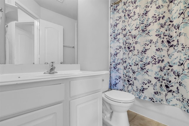 7402 Hollister Rdg, Houston, TX 77040 - bathroom with vanity, tile patterned floors, and shower / bath combo with shower curtain