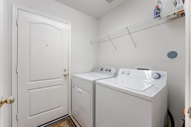 17906 Keenan Cv, Houston, TX 77084 - laundry area featuring washing machine and dryer