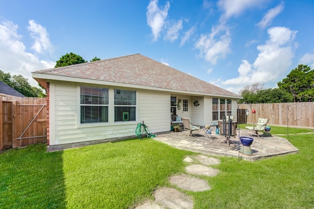 17906 Keenan Cv, Houston, TX 77084 - back of property with a patio, a fenced backyard, and a shingled roof
