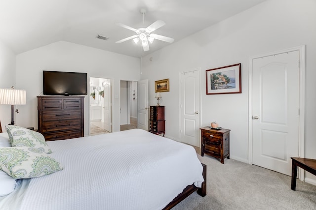17906 Keenan Cv, Houston, TX 77084 - bedroom with light colored carpet, vaulted ceiling, ceiling fan, and connected bathroom