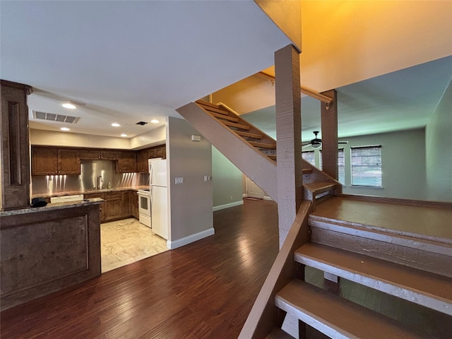 2219 Triway Ln Unit 240, Houston, TX 77043 - stairs featuring wood finished floors and recessed lighting