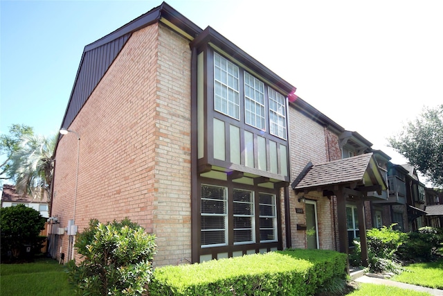 2219 Triway Ln Unit 240, Houston, TX 77043 - view of property exterior featuring brick siding