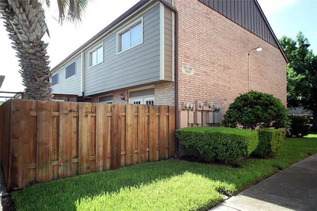 2219 Triway Ln Unit 240, Houston, TX 77043 - view of home's exterior with brick siding and board and batten siding