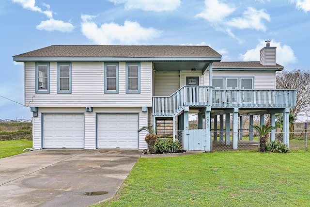 4023 Spanish Main Blvd, Galveston, TX 77554 - view of front of house with stairway, driveway, an attached garage, a chimney, and covered porch