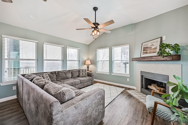 4023 Spanish Main Blvd, Galveston, TX 77554 - living room with ceiling fan, vaulted ceiling, a fireplace, and wood finished floors