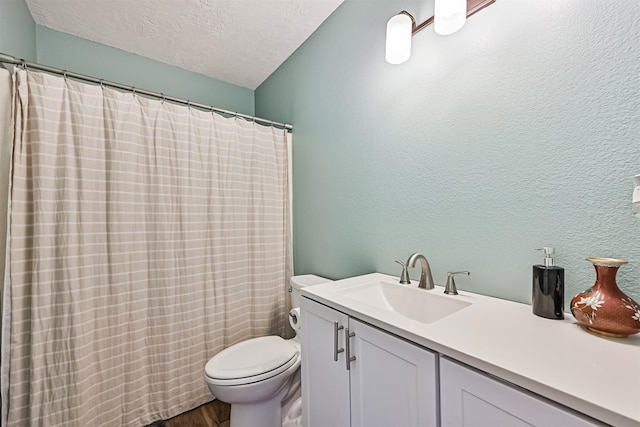 4023 Spanish Main Blvd, Galveston, TX 77554 - full bath featuring wood finished floors, vanity, a textured ceiling, and curtained shower