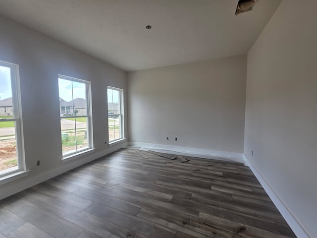 2035 Winepress Rd, Brenham, TX 77833 - spare room featuring baseboards and wood finished floors