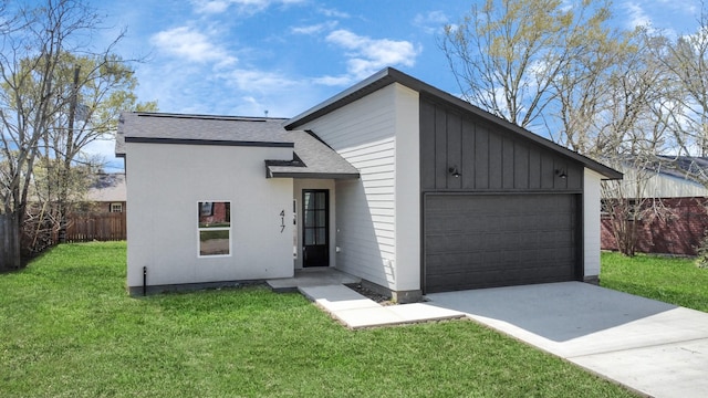 417 Harold Ln, Baytown, TX 77521 - view of front of property with a garage, a shingled roof, and concrete driveway