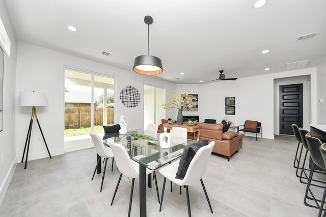 417 Harold Ln, Baytown, TX 77521 - dining space featuring recessed lighting, a ceiling fan, and concrete flooring