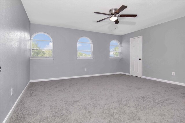 12811 Golden Tee Ln, Houston, TX 77099 - empty room with a ceiling fan and carpet