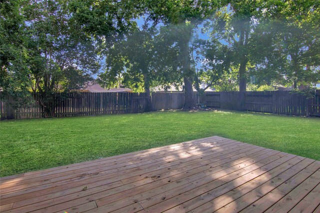 12811 Golden Tee Ln, Houston, TX 77099 - wooden deck featuring a fenced backyard